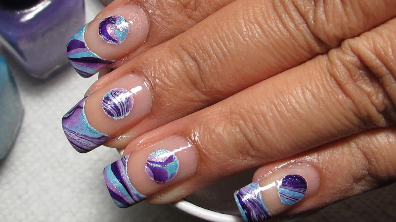 Check Out This Unique Negative E Water Marble Nail Design
